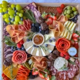 Charcuterie board with cheeses, cured meats, fruit and accompaniments | Always on Board